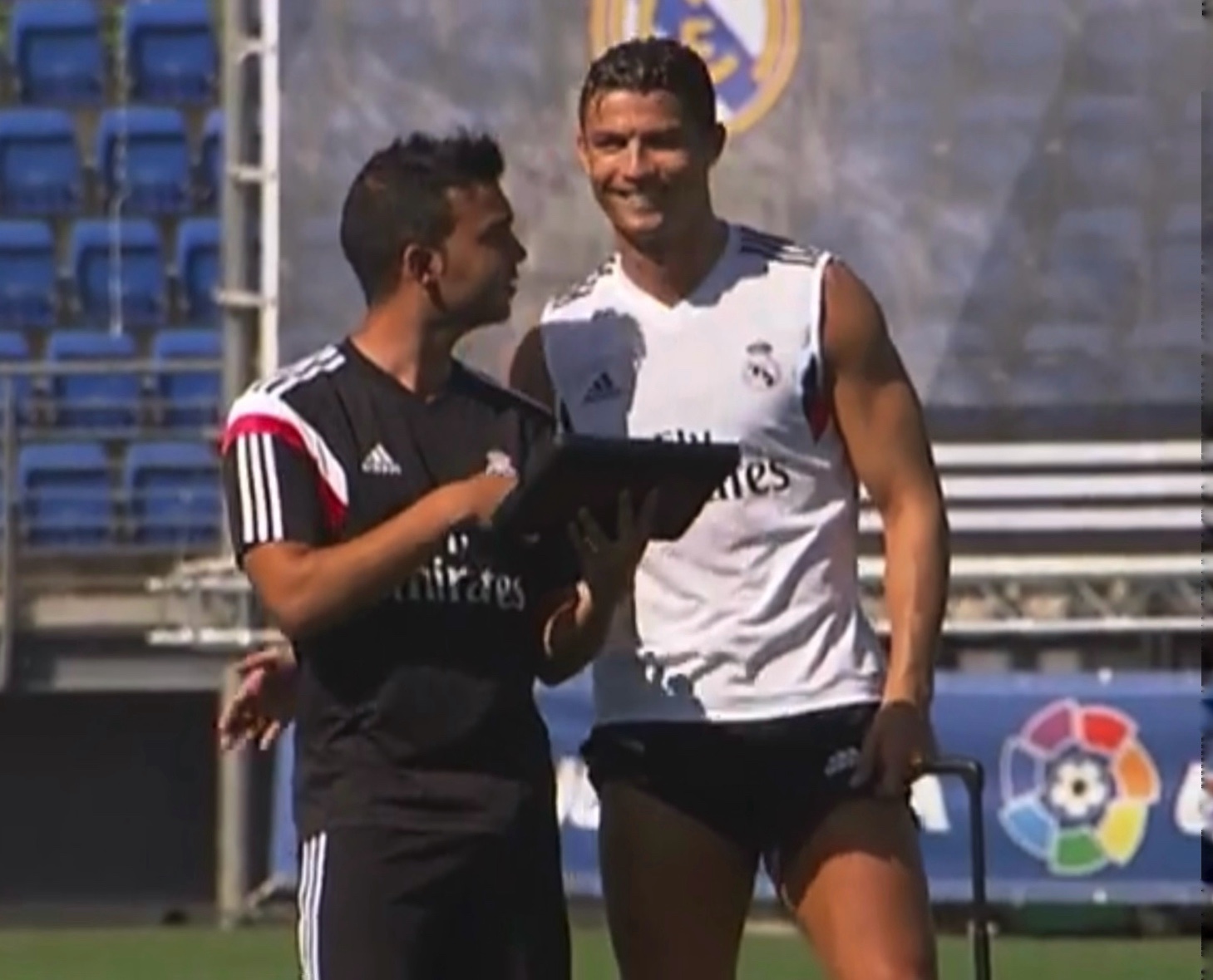 Historical photo of David Chorro on the training pitch with Cristiano Ronaldo